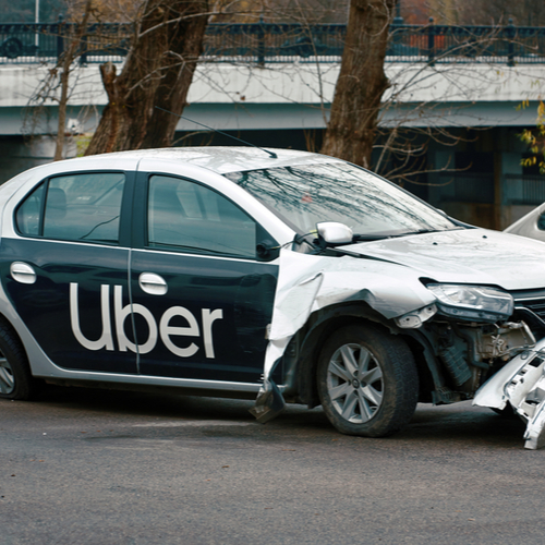 Image is of a wrecked uber car after contacting Brockton uber accident lawyer